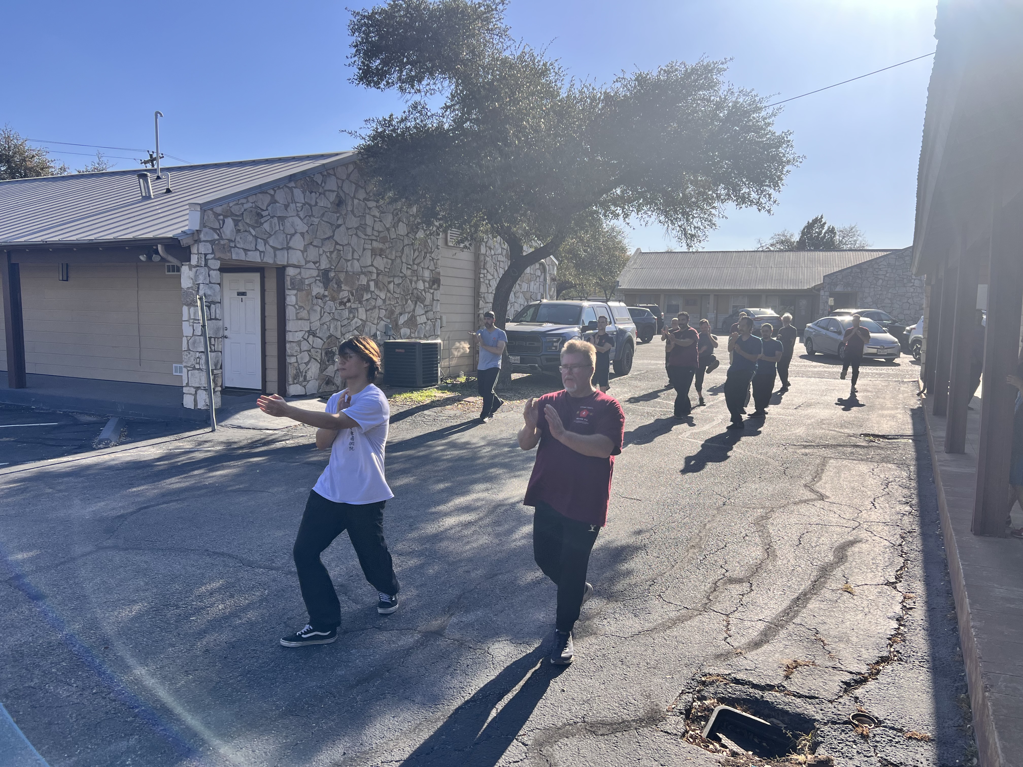 Adults practicing Wing Chun Kung Fu together outdoors in Houston TX