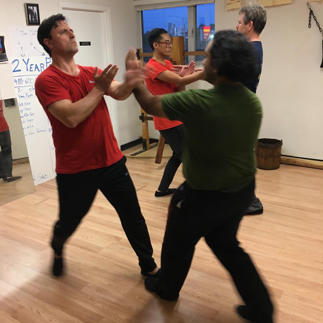 Wing Chun partner drill for practical self-defense training in Houston Texas